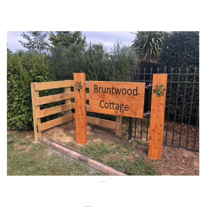 Macrocarpa Sign - Bruntwood Cottage